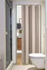 A bathroom with a toilet and a shower stall, with a folding door in the center. Produktbild-Vorschau