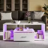 A modern living room scene featuring a white high-gloss coffee table with RGB LED lighting, placed in front of a dark gray sofa. Náhľad obrázku produktu