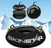 Multiple views of a snow tube against a snowy mountain backdrop. Voir les images du produit