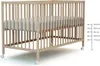 A wooden baby crib with a mattress, shown from the side with measurement indicators on the right. Anteprima dell’immagine prodotto
