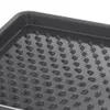 A close-up view of a dark gray shoe tray with a textured surface. Podgląd zdjęcia produktu