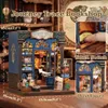 A miniature bookshop model with lights, displayed on a wooden surface with a map in the background. Náhled obrázku produktu