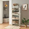 A hallway with a shoe cabinet, bench, and wall decor. Produktbild-Vorschau