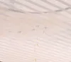 Water droplets falling through a mesh material. Náhľad obrázku produktu