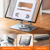 A tablet stand is shown on a wooden desk, with close-up insets highlighting its anti-slip features. Produktbild-Vorschau