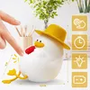 A hand is touching a silicone duck night light. There are also icons and measurements shown. Produktbild-Vorschau