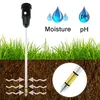 A soil moisture and pH meter inserted into the ground, with illustrations of water droplets and pH symbols above. Produktbild-Vorschau