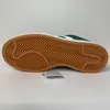 The image shows the sole of a green and white Adidas sneaker against a white background. Náhled obrázku produktu