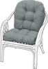 A white rattan chair with a gray cushion. Produktbild-Vorschau