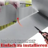 Hands installing a grey privacy screen onto a fence. Produktbild-Vorschau