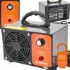 Three ozone generators are displayed against a light gray background. The main product in the foreground is a gray and orange ozone generator with a black handle. Two other ozone generators are visible in the background, one to the left and one to the righ Podgląd zdjęcia produktu