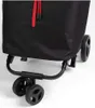 Close-up view of the bottom part of a black shopping trolley with red drawstrings. Podgląd zdjęcia produktu