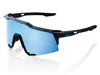 A pair of black and blue sports sunglasses with blue mirrored lenses, shown from a side-angle on a white background. Náhled obrázku produktu