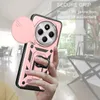 A hand holding a rose gold phone case with a camera cover and ring holder, with a blurred indoor background. Produktbild-Vorschau