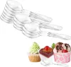 A stack of clear plastic spoons and a few desserts. Produktbild-Vorschau