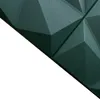 A close-up view of a textured, geometric green surface. Anteprima dell’immagine prodotto