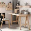 A home office or study area with a wooden desk, chair, and wall-mounted storage units. Anteprima dell’immagine prodotto