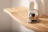 A close-up of a wooden shelf with decorative items. Produktbild-Vorschau