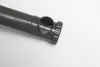 A close-up shot of a gray plastic pipe fitting with a side outlet, set against a plain white background. Produktbild-Vorschau