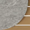 A close-up view of a round, gray marble-patterned surface with white veining, partially overlapping a background of horizontal brown wooden planks separated by thin white lines. Produktbild-Vorschau