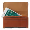 A smartphone is partially inserted into a brown leather wallet case with card slots. Produktbild-Vorschau