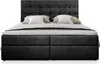 A black upholstered boxspring bed with a tufted headboard and two storage drawers at the base, shown against a white background. Produktbild-Vorschau