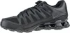 A black Nike Reax 8 Tr Mesh sneaker shown from the side. Produktbild-Vorschau