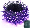 A coiled string of purple LED lights with a green battery pack. Produktbild-Vorschau