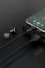 A magnetic charging cable and its adapters are shown connected to a smartphone and a power bank. Produktbild-Vorschau