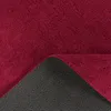 A close-up view of a red rug, showing its texture and the anti-slip backing. Produktbild-Vorschau