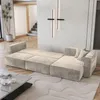 A modern living room with a modular sofa, coffee table, and a plant. Produktbild-Vorschau