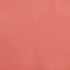 A plain background shot of a coral-colored armchair. Náhľad obrázku produktu