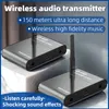 Two wireless audio transmitter/receiver units are shown on a light gray and white surface. Náhľad obrázku produktu