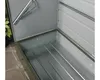 Interior view of an open metal storage box. Náhľad obrázku produktu
