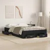 A black wooden bed frame with drawers is shown in a bedroom setting. Produktbild-Vorschau