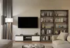 A modern living room with a TV, entertainment center, and bookshelf. Voir les images du produit