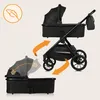A black baby stroller with a bassinet is shown, with arrows indicating how the bassinet can be detached and folded. Produktbild-Vorschau