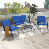 A patio furniture set on a balcony with a view of buildings and trees. Podgląd zdjęcia produktu