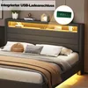 A bed with a headboard featuring integrated lighting and a USB charging port. Produktbild-Vorschau