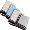 A stack of quilted storage bags in different colors (beige, light blue, and gray) against a white background. Produktbild-Vorschau