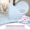 A neatly made bed with a pillow and duvet, showcasing the texture of the fabric. Produktbild-Vorschau