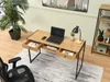 A home office setup with a desk, chair, laptop, and plant. Podgląd zdjęcia produktu