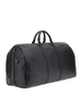 A black duffel bag shown from a side-angle against a white background. Produktbild-Vorschau