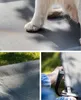 A collage of images showing a dog's paw on a pet bed, a close-up of the mesh fabric, and a hand holding a handle of the pet bed. Anteprima dell’immagine prodotto