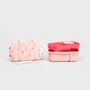 Two lunchboxes and a spoon on a light gray background. Podgląd zdjęcia produktu