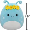 A blue plush toy alien with a flower crown and white spots, with a size indicator on the right. Podgląd zdjęcia produktu