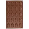 A brown silicone baking mold with multiple shell-shaped cavities. Produktbild-Vorschau