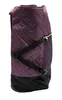 A side view of a purple quilted shopping roller bag with black accents and wheels. Voir les images du produit
