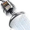 A close-up, cutaway view of a shower head with a visible multi-layer filter inside, showing water spraying from the shower head. Náhľad obrázku produktu
