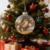 A close-up of a Christmas tree decorated with ornaments and gifts underneath. Produktbild-Vorschau